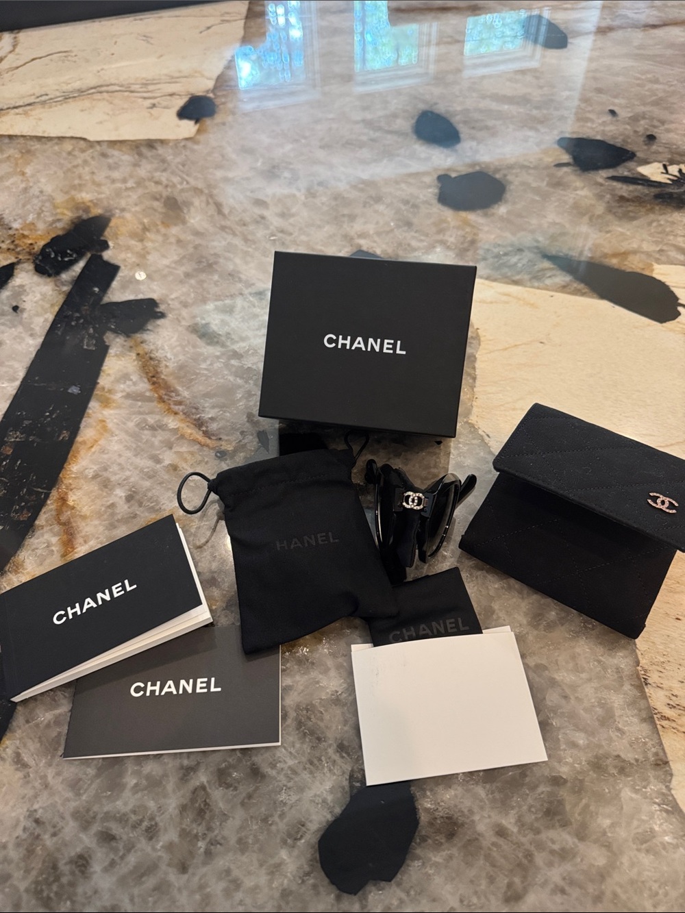 CHANEL Black foldable Sunglasses with CC Logo